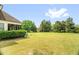 Lush backyard with mature landscaping, offering privacy and ample space for outdoor activities and relaxation at 432 Kings Hollow Dr, Raleigh, NC 27603
