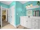 Full bathroom features a double sink vanity, stain glass window, and tile flooring at 432 Kings Hollow Dr, Raleigh, NC 27603