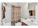 Well-lit bathroom with a shower-tub combo at 45 Summersweet Ln, Chapel Hill, NC 27516