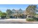 Exterior view of a Briar Chapel clubhouse with stone accents, covered patios, and landscaped entrance at 45 Summersweet Ln, Chapel Hill, NC 27516