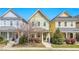 Charming two-story home with a cozy front porch situated between similar homes at 45 Summersweet Ln, Chapel Hill, NC 27516