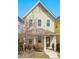 Charming two-story home with a cozy front porch and lush landscaping at 45 Summersweet Ln, Chapel Hill, NC 27516