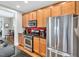 Well-appointed kitchen features stainless steel appliances, granite countertops, and seamless access to adjacent rooms at 45 Summersweet Ln, Chapel Hill, NC 27516
