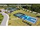 Aerial view of The Courts at Boulder Point featuring tennis courts, pickleball court, and basketball court at 45 Summersweet Ln, Chapel Hill, NC 27516