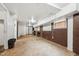 Basement featuring tile floors and painted brick accents with some natural light from a window at 518 N Gutherie Ave, Durham, NC 27703