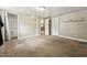 Neutral bedroom with carpet and access doors on multiple walls at 518 N Gutherie Ave, Durham, NC 27703