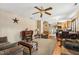 Inviting living room with hardwood flooring, a fireplace, and neutral-toned furniture at 518 N Gutherie Ave, Durham, NC 27703