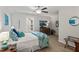 Bright bedroom with carpet, ceiling fan, and a cozy bed with decorative pillows and artwork at 53 Azul Dr, Clayton, NC 27520