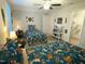 Bedroom featuring two patterned twin beds, a ceiling fan, and wall decor and accents at 53 Azul Dr, Clayton, NC 27520