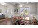 Inviting dining room with ample natural light and front door view at 53 Azul Dr, Clayton, NC 27520