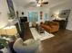 Cozy living room featuring a fireplace, comfortable seating, and stylish decor elements at 53 Azul Dr, Clayton, NC 27520