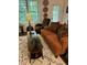 Living room featuring decorative pillows, wood flooring, and a patterned rug at 53 Azul Dr, Clayton, NC 27520