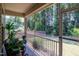 Relaxing screened porch with view of private, wooded backyard at 53 Azul Dr, Clayton, NC 27520