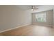Spacious bedroom featuring a ceiling fan and a window for natural light at 5604 Stardust Dr, Durham, NC 27712