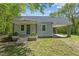 Charming single-story home with a covered carport and a cozy front porch at 5864 Whitney Rd, Graham, NC 27253