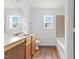 Bathroom with a classic vanity and a shower-tub combo at 707 Obsidian Way, Durham, NC 27703