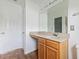 Neutral bathroom with a vanity and a shower/tub combo at 707 Obsidian Way, Durham, NC 27703