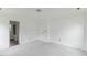 Spacious bedroom with light-colored walls and carpeting at 707 Obsidian Way, Durham, NC 27703
