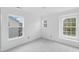 Inviting bedroom featuring soft carpeting, and large windows providing abundant natural light at 707 Obsidian Way, Durham, NC 27703