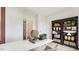 Home office featuring a stylish bookcase and a decorative globe and succulent display at 712 Holstein Dairy Way, Wake Forest, NC 27587