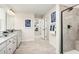 Bright bathroom featuring a glass enclosed shower and stylish finishes at 801 Walker Ridge Way, Willow Springs, NC 27592