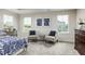 Bright bedroom features neutral carpet, and ample natural light at 801 Walker Ridge Way, Willow Springs, NC 27592