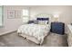 Inviting bedroom with stylish furnishings, bedside tables, and neutral carpet at 801 Walker Ridge Way, Willow Springs, NC 27592