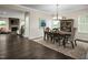 Elegant dining room with hardwood floors and stylish furnishings at 801 Walker Ridge Way, Willow Springs, NC 27592