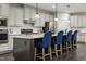 Kitchen featuring a large island with granite countertops and stainless steel appliances at 801 Walker Ridge Way, Willow Springs, NC 27592