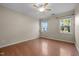 Bedroom with hardwood floors, natural light, and neutral wall color at 814 Ember Dr, Durham, NC 27703