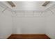Walk-in closet with wire shelving, maximizing storage space at 814 Ember Dr, Durham, NC 27703