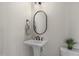 Powder room features a modern sink and toilet at 818 St Charles St, Durham, NC 27713