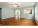 This spacious living room features hardwood floors and a pass-through to the kitchen, perfect for entertaining at 830 Finnbar Dr, Cary, NC 27519