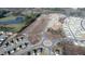 Expansive aerial view showcasing the community's layout with lush landscaping and desirable home sites at 841 Kenyon Spring Dr, Zebulon, NC 27597