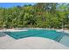 Enjoy the community pool, perfect for relaxation and recreation, complete with lounge chairs and pristine landscaping at 841 Kenyon Spring Dr, Zebulon, NC 27597