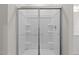 Shower stall with clear glass doors and built-in shelving at 841 Kenyon Spring Dr, Zebulon, NC 27597