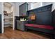 Mudroom with a bench, storage, and access to a pantry with shelving at Lot 1 Northpointe Farms Trl, Efland, NC 27243