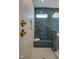 Modern tiled shower with bench, dual shower heads, and recessed shelving provides comfortable bathing at Lot 2 Northpointe Farms Trl, Efland, NC 27243