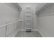 Walk-in closet with shelving at 10133 Bessborough Dr, Raleigh, NC 27617