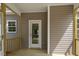 Covered porch with a wood deck and access to the backyard at 106 S Harper Faith Way, Benson, NC 27504