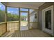 Screened-in back porch, perfect for relaxing and entertaining at 106 S Harper Faith Way, Benson, NC 27504