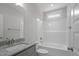 Bathroom featuring granite countertop, single sink vanity, and a shower-tub combination with tile surround at 106 S Harper Faith Way, Benson, NC 27504