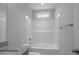 Bathroom featuring granite countertop, single sink vanity, and a shower-tub combination with tile surround at 106 S Harper Faith Way, Benson, NC 27504