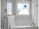 Close up of a bathroom featuring a stand alone tub at 106 S Harper Faith Way, Benson, NC 27504