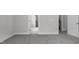 Neutral bedroom showing carpeted floors, base trim, and access to closet or ensuite at 106 S Harper Faith Way, Benson, NC 27504