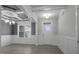 Beautiful dining room featuring gray walls, chair rail, hardwood floors and a modern chandelier at 106 S Harper Faith Way, Benson, NC 27504