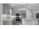 Kitchen with granite countertops, gray cabinets, stainless appliances and decorative ceiling beams at 106 S Harper Faith Way, Benson, NC 27504