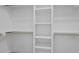 Spacious walk-in closet with built-in shelving and ample hanging space for organized storage at 106 S Harper Faith Way, Benson, NC 27504
