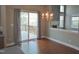 Cozy dining area with access to outdoor deck, providing a relaxing and nature-filled dining experience at 109 Bright Shade Ct, Holly Springs, NC 27540