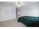 Spacious bedroom with an abundance of natural light and a ceiling fan at 11011 Southwalk Ln, Raleigh, NC 27614